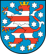 Landeswappen von Thüringen mit dem rot-weißen Löwen als zentrales Symbol.